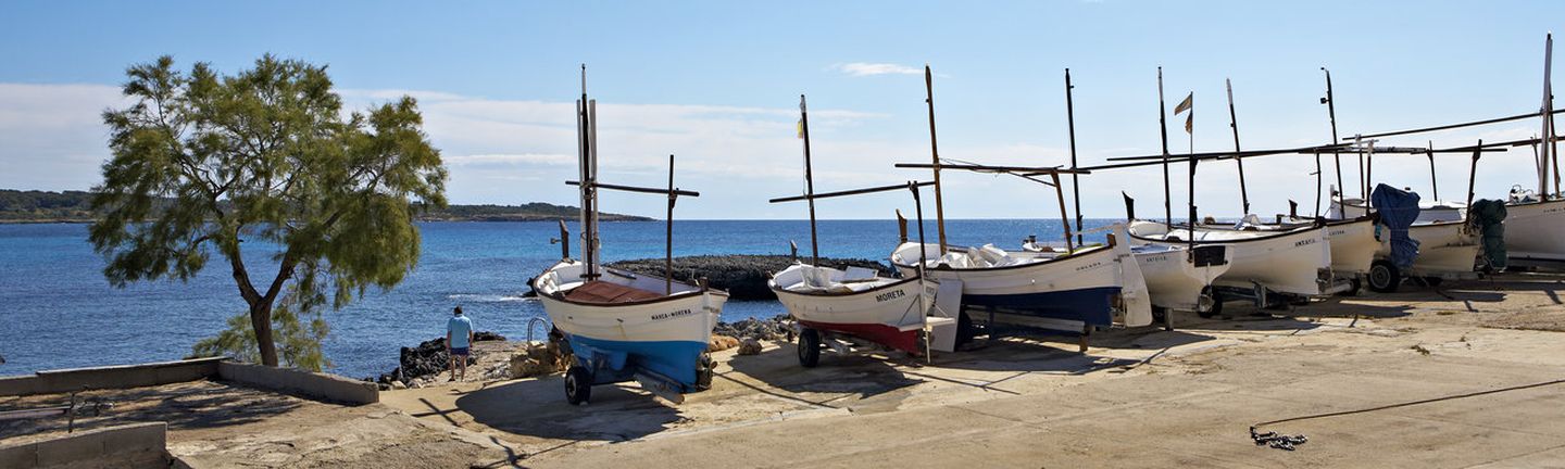 Universal Mallorca Travel Leitbild Universal Flugreisen AG Boote am Steg in S'Illot Sillot 