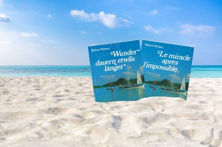 Universal Mallorca Ferien Wunder dauern etwas länger Buch im Sand