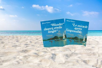 Universal Mallorca Travel Buch Wunder dauern etwas länger Buch im Sand